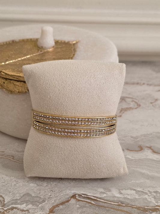 four row cubic zirconia statement bangle