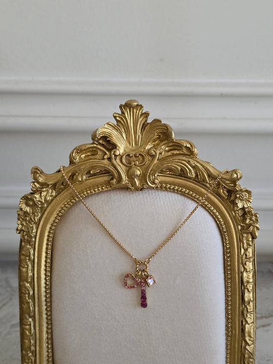 gold stainless steel charm necklace with cubic zirconia heart.