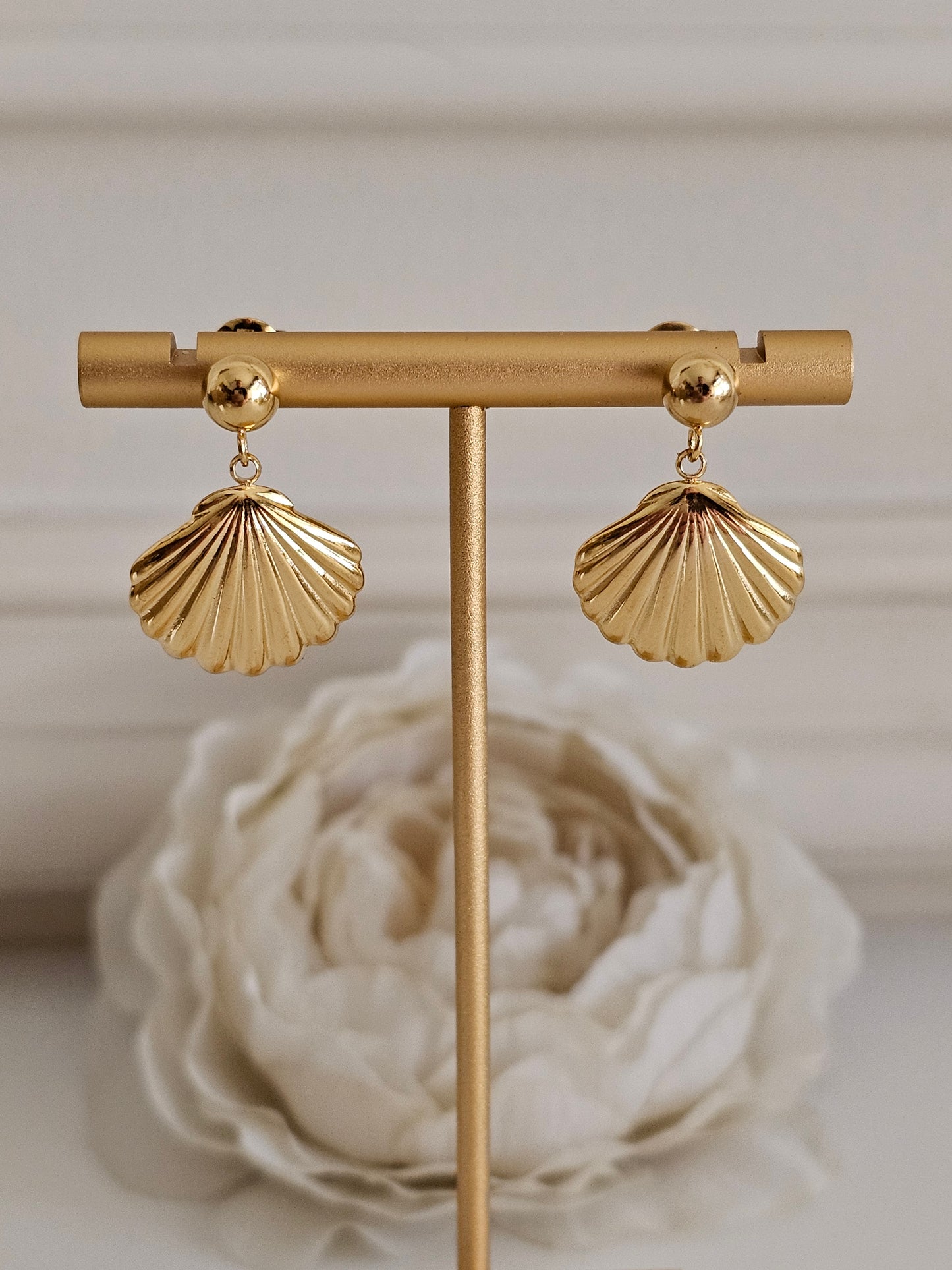 Gold long shell earrings