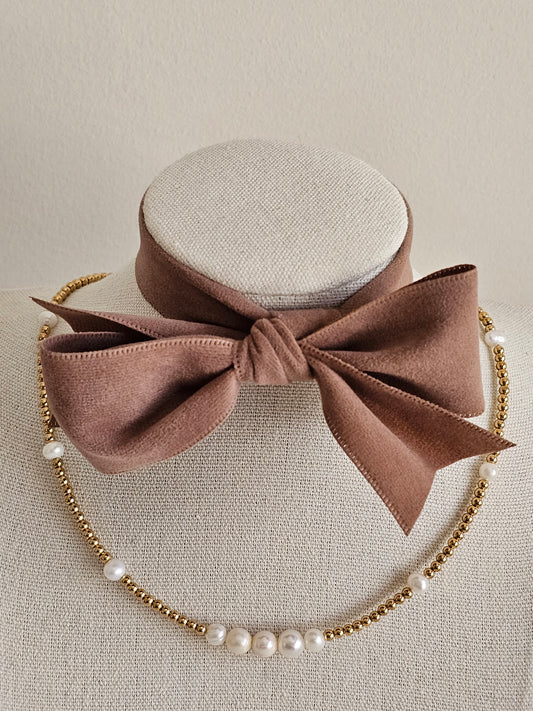 Pearl and gold necklace