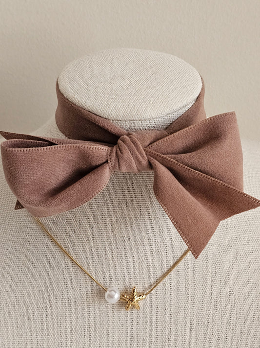 Gold starfish and pearl necklace