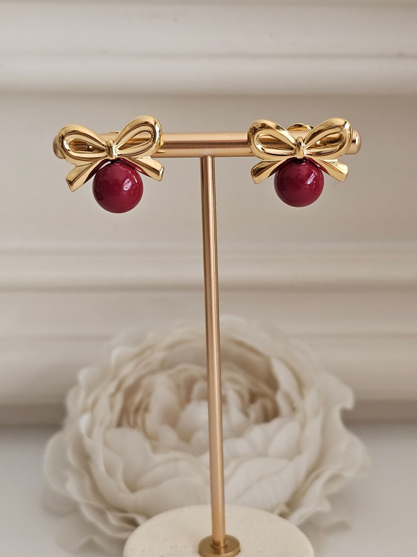 Gold and red bow earrings