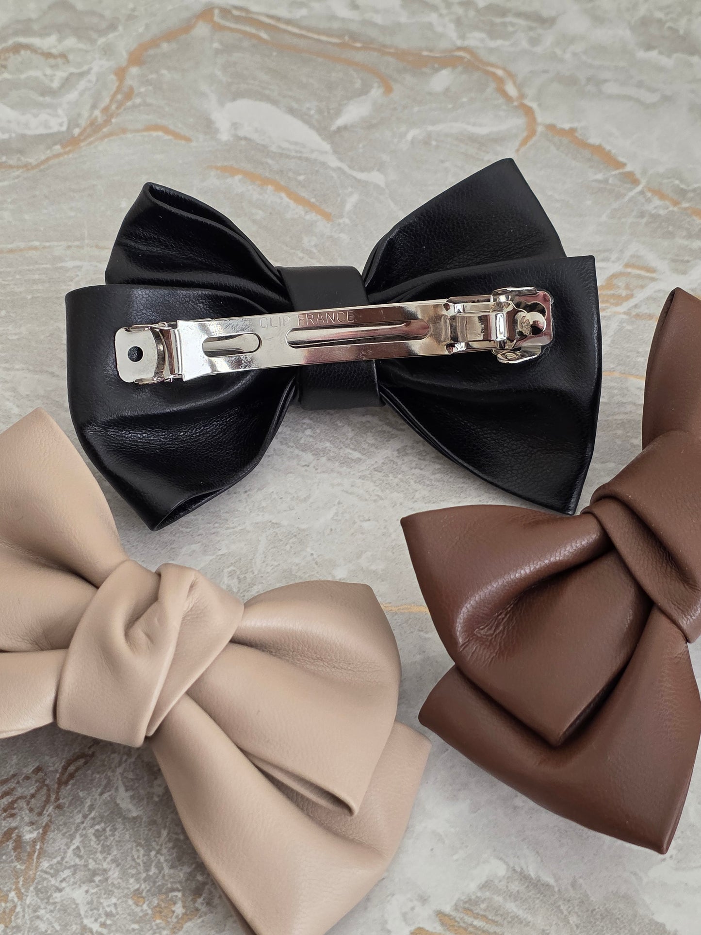 LEATHER BOW HAIR CLIP