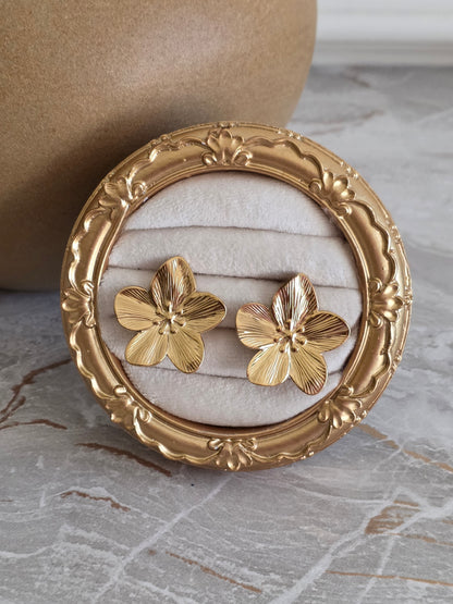 Gold statement flower earrings