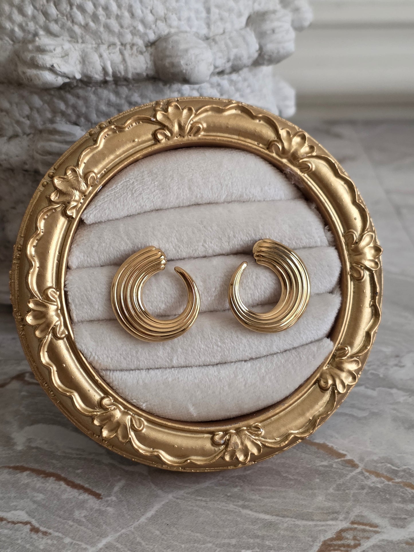 gold round statement earrings