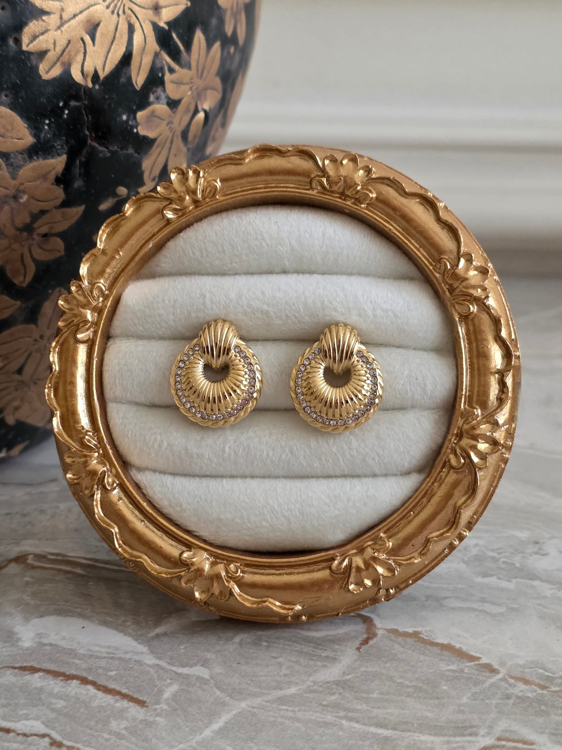 gold round statement earrings