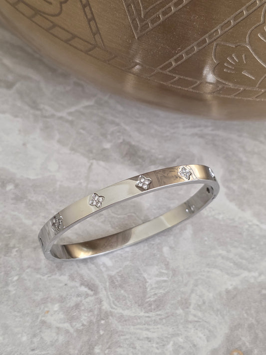 stainless steel clover bangle with cubic zirconia