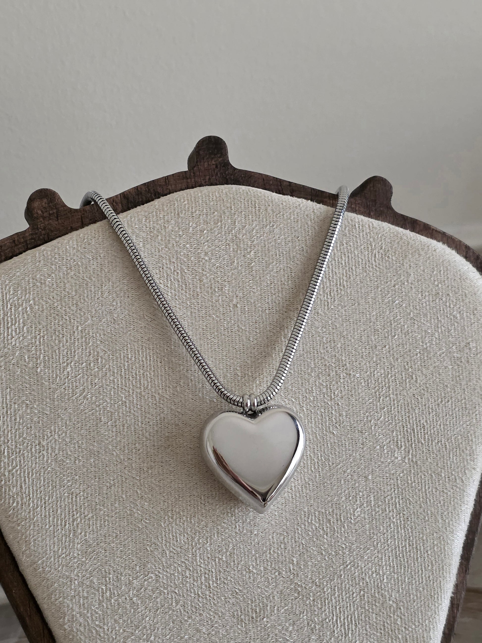 silver heart statement necklace with snake chain