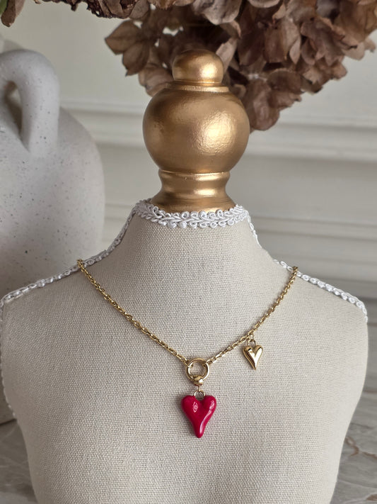 gold necklace with red enamel heart
