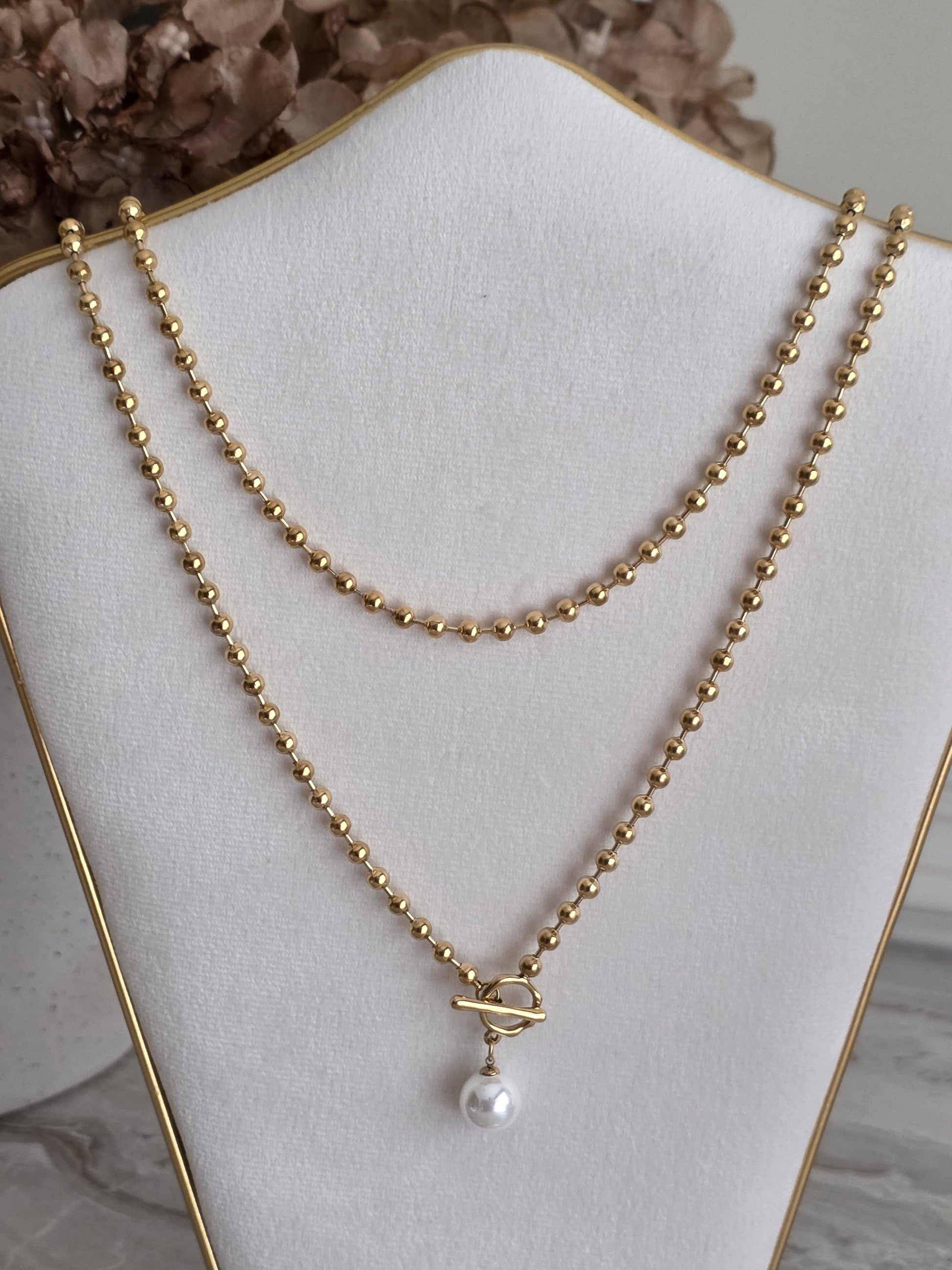 Long stainless steel pearl necklace
