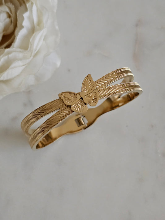 Gold plated stainless steel butterfly bangle 