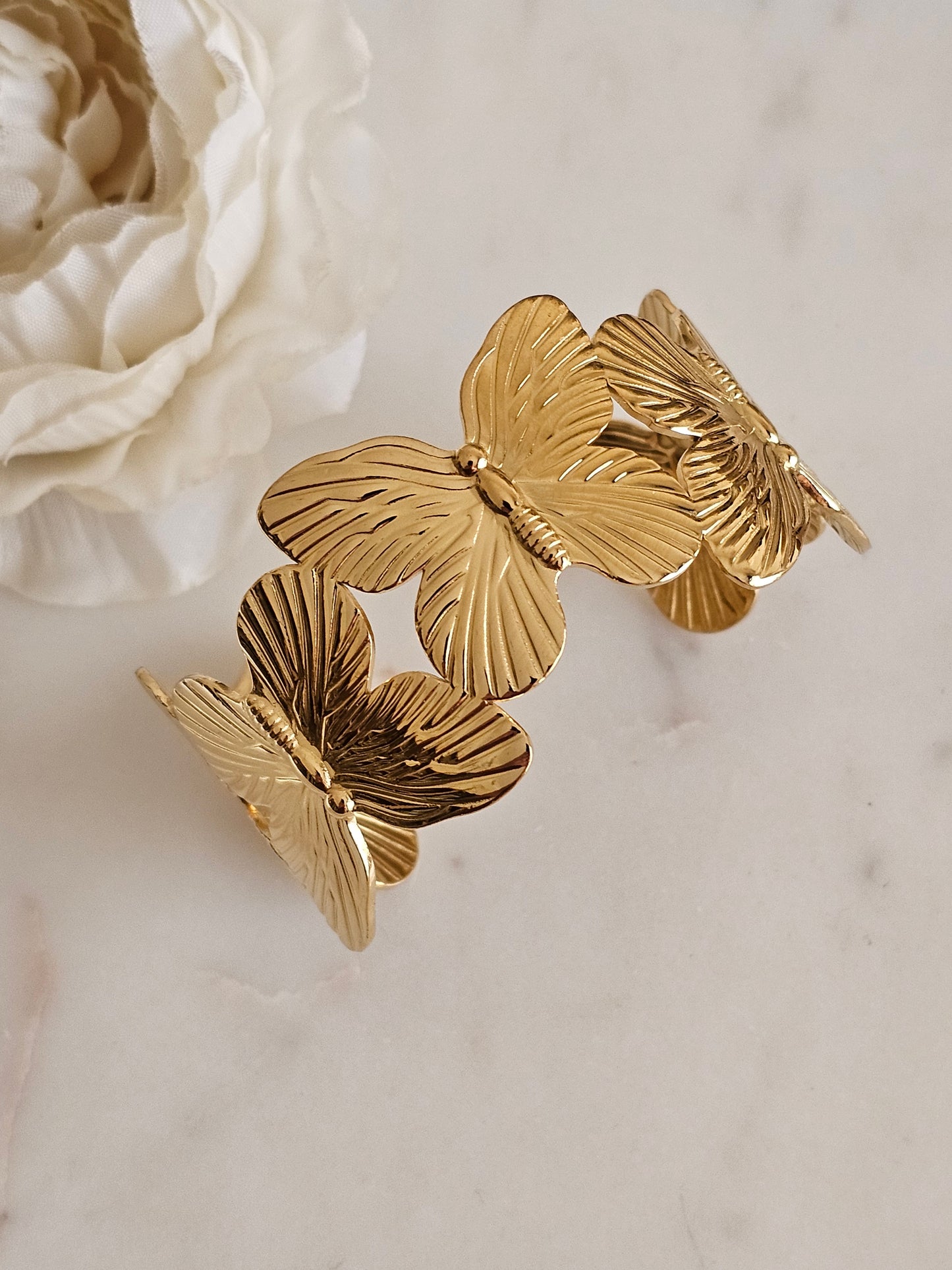 Gold plated stainless steel butterfly cuff bangle