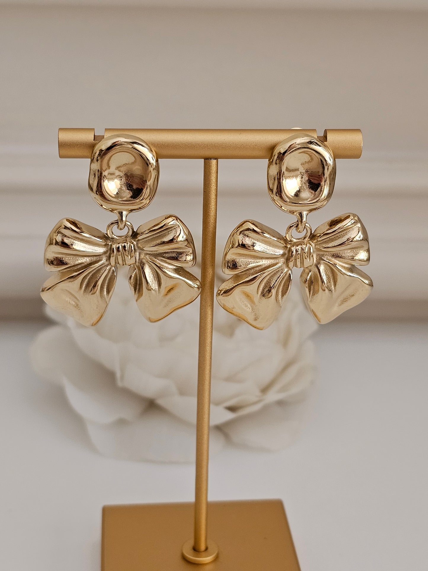 statement bow earrings