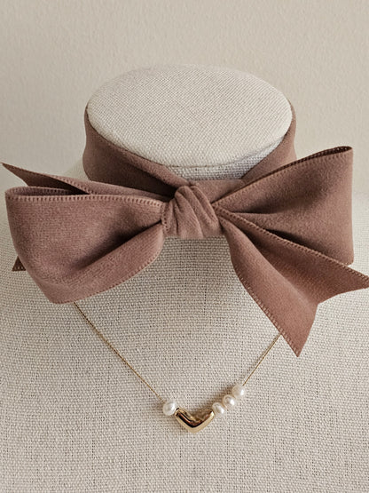 Gold pearl heart necklace