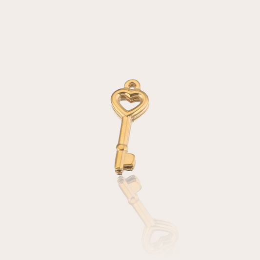 Vintage key charm