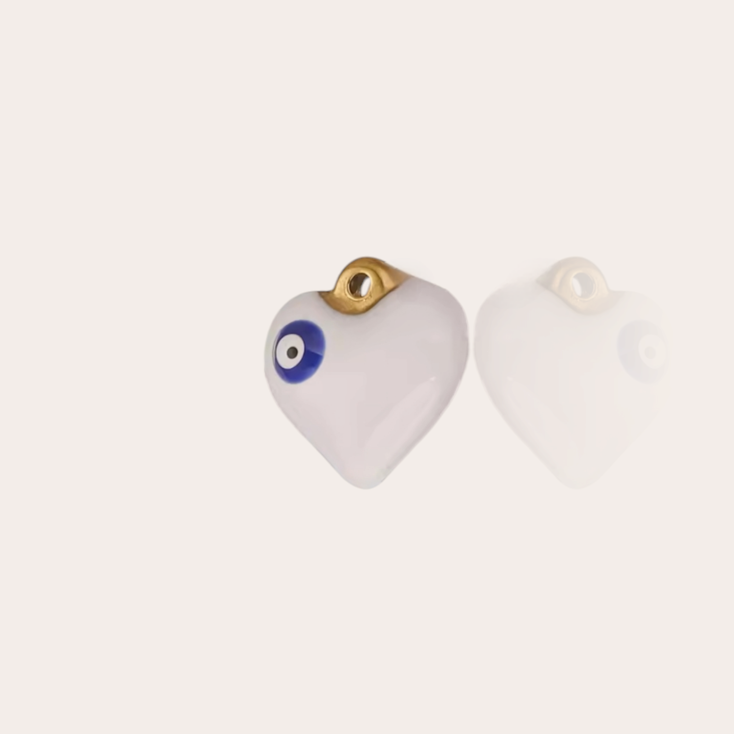 White heart evil eye charm