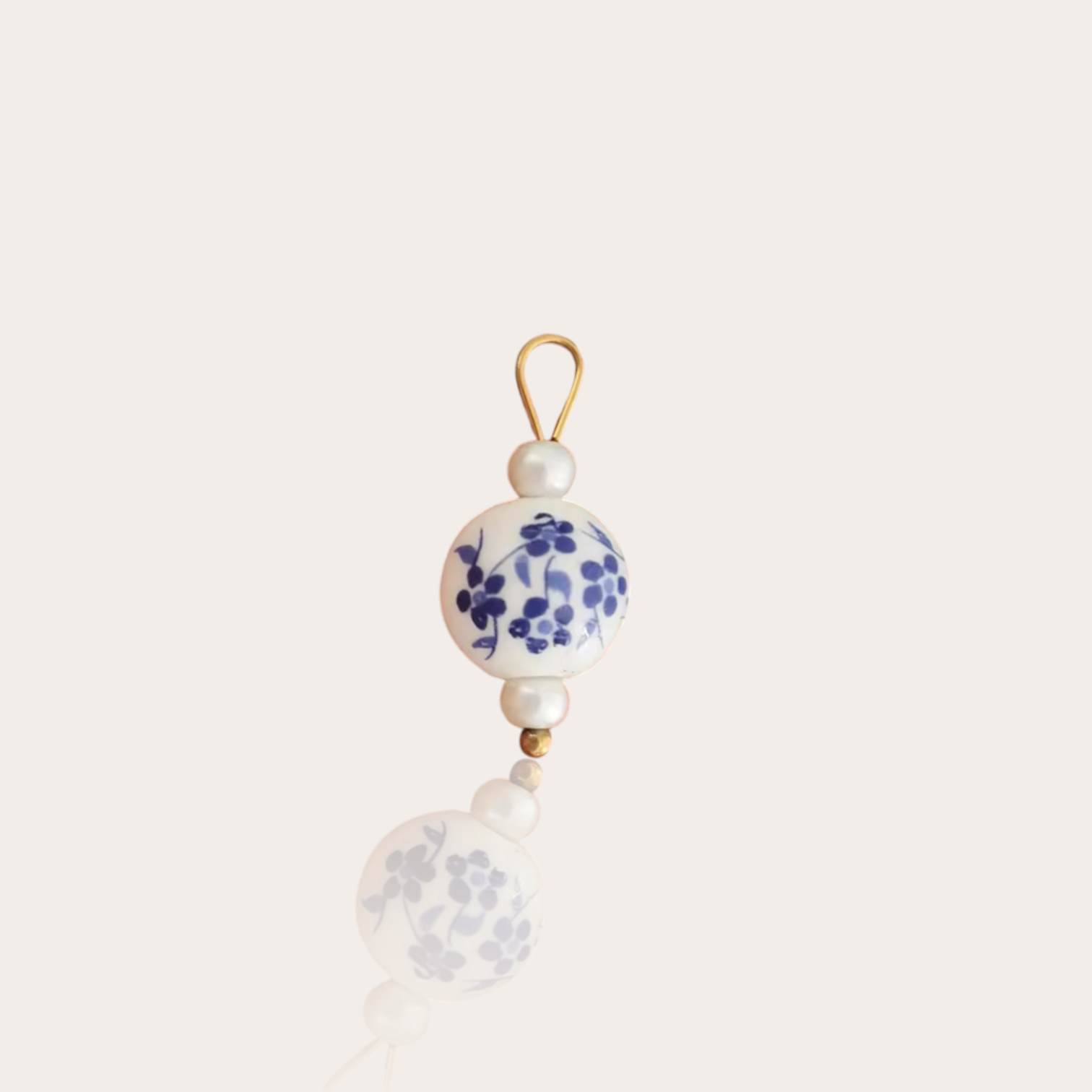 Round flower ceramic charm