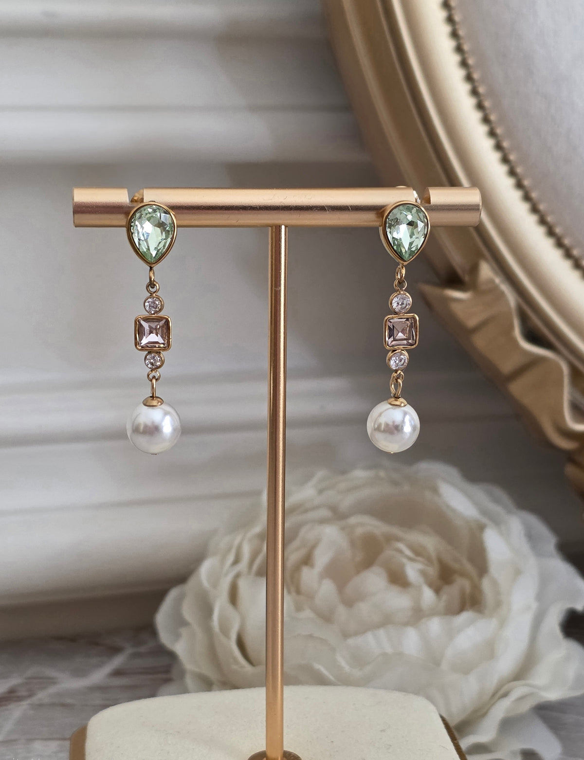 Farah Pearl Earrings with green teardrop stones, crystal accents and simulated pearl drops in a gold-tone finish.