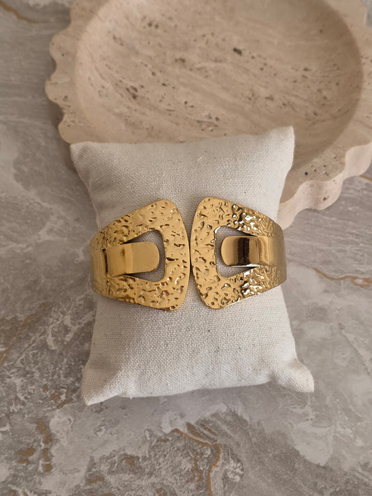 Gold statement bangle