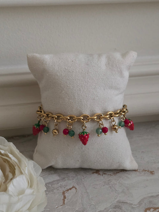 Gold chain bracelet with red strawberry charms and green beads 