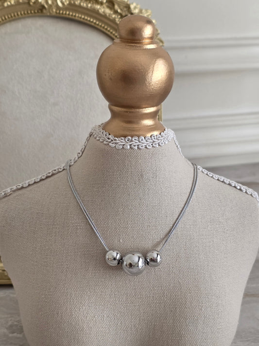 Silver statement ball necklace