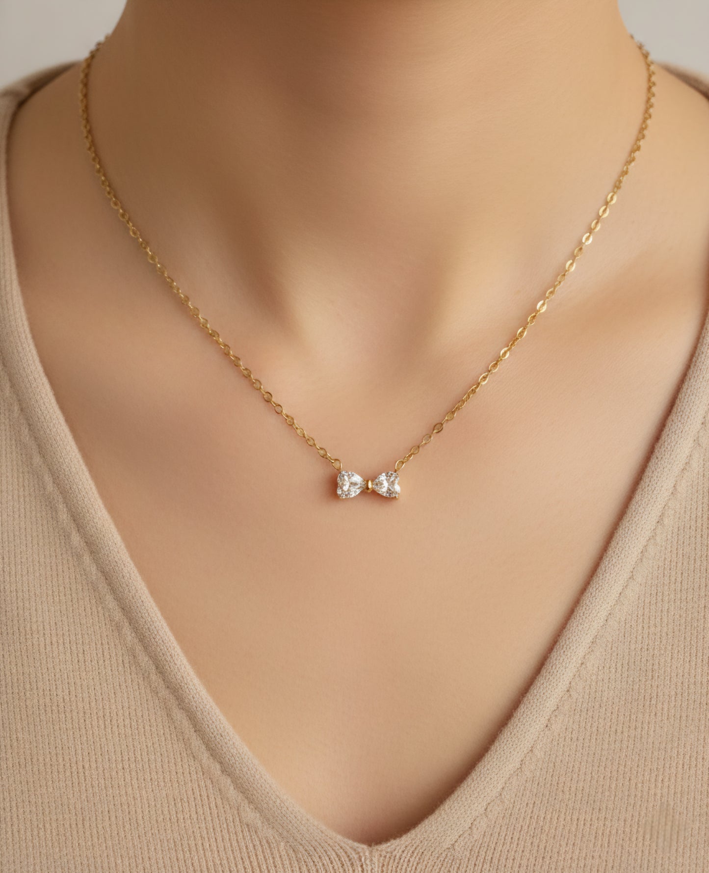 PERIN BOW NECKLACE
