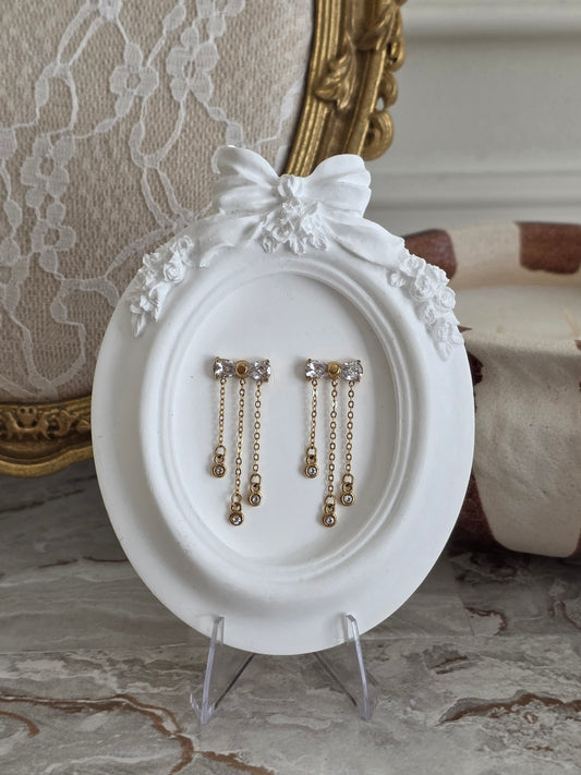 Gold bow earrings with Cubic Zirconia