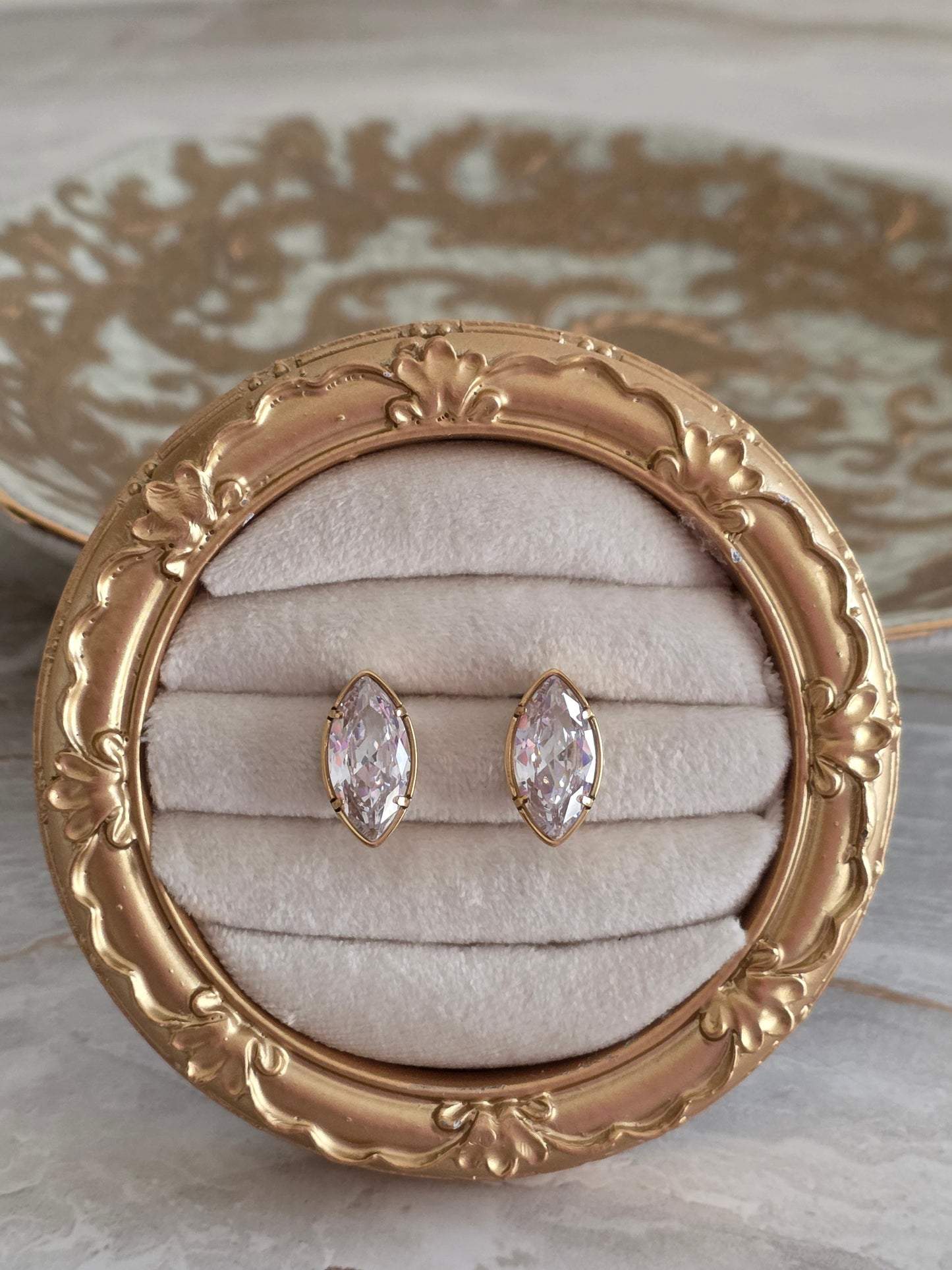 Gold crystal oval stud earrings