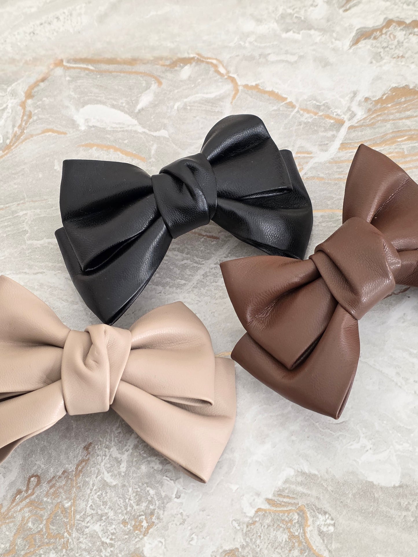 LEATHER BOW HAIR CLIP