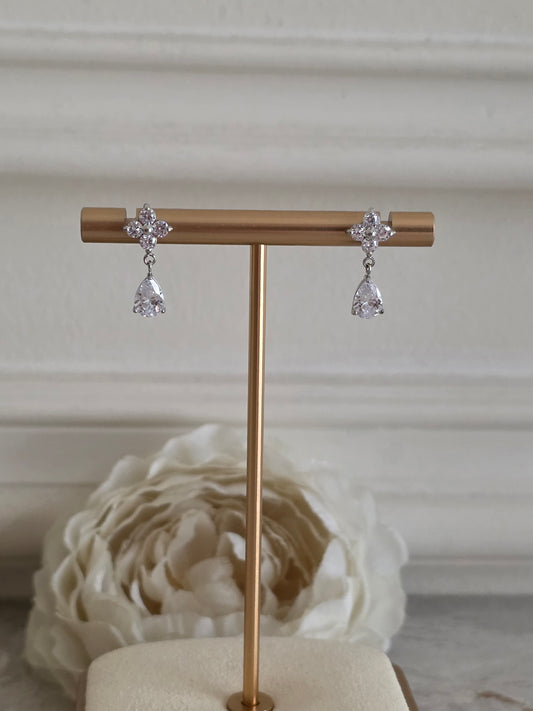 Silver tear drop cubic zirconia and clover earrings