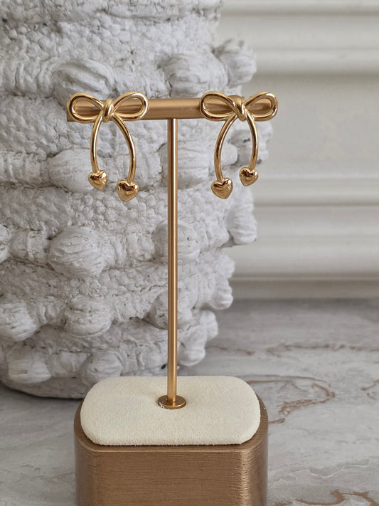 Gold statement bow earrings