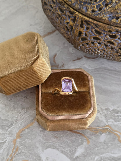 Gold ring with purple cubic zirconia 