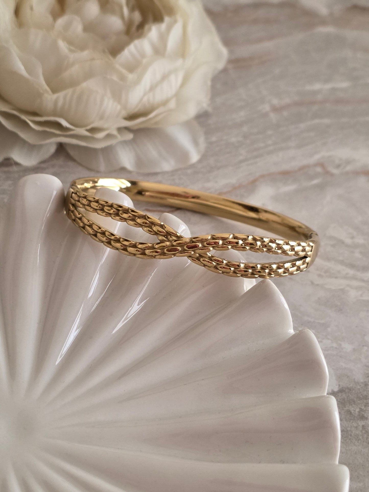 Gold twist bangle