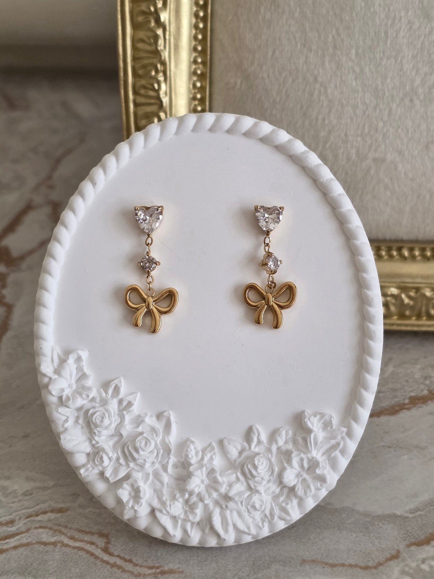 ASHRA BOW EARRINGS