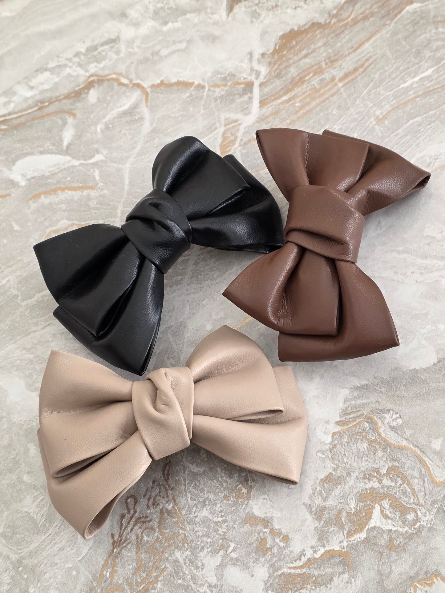 LEATHER BOW HAIR CLIP