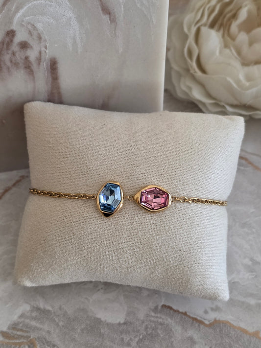 Zayla Bracelet featuring blue and pink faceted stones in gold-tone settings with a delicate chain.